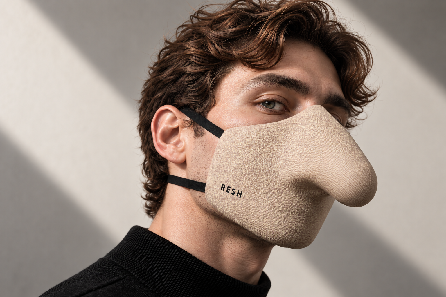 Model wearing the RESH big-nose mask